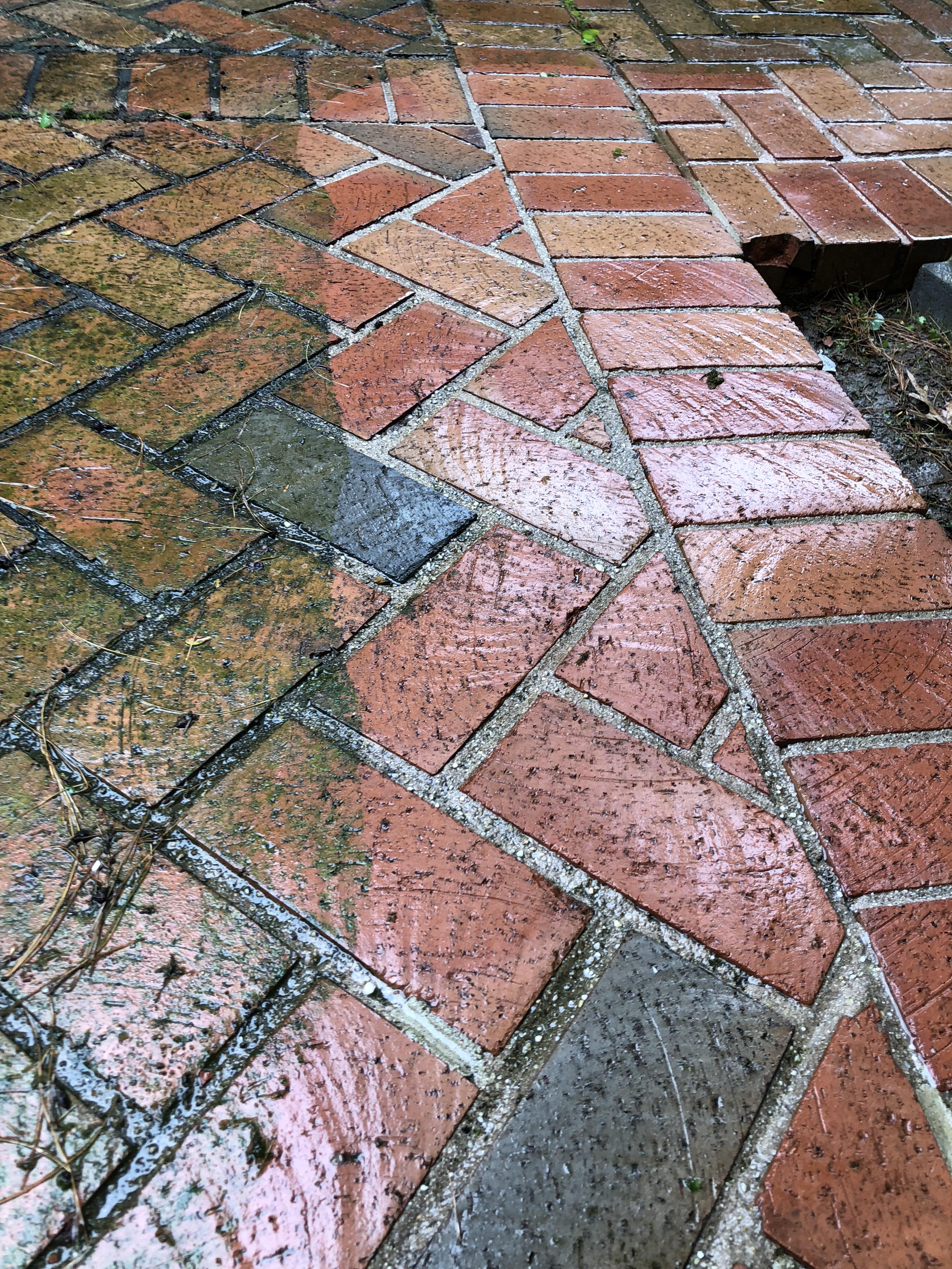 a pressure washed brick patio